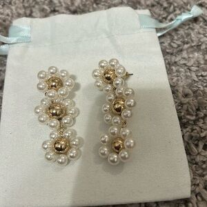 Pearl and gold daisy drop earrings